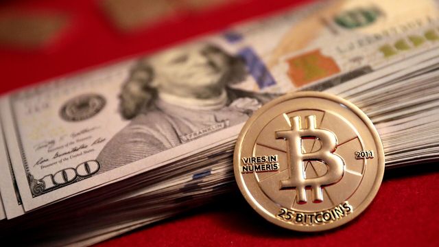 Physical 25 BTC gold Casascius coin on $100 bills — Bitcoin's best September on record and the October setup