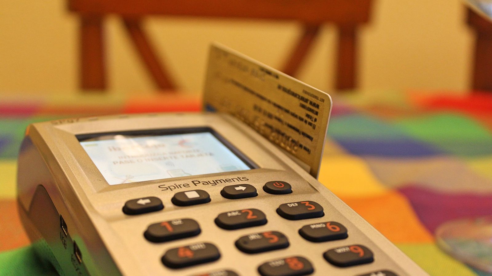 Card payment terminal on a counter — Plasma's 1.76 billion XPL unlock on September 25, 2026 and the 63% circulating-supply cliff