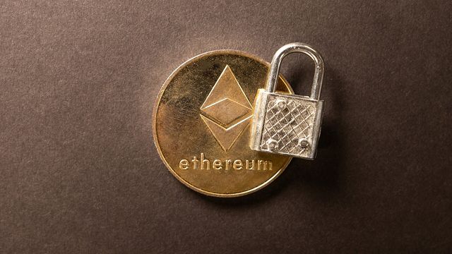 A gold physical Ethereum coin beside a silver padlock — Ethereum Faucet review: 0.00014 ETH every 15 minutes