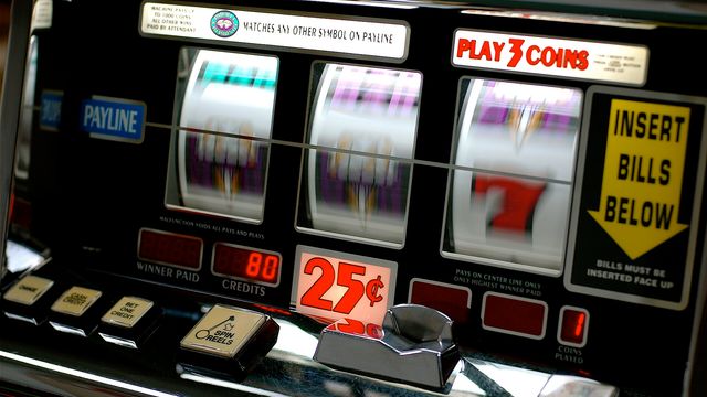 A classic three-reel slot machine cabinet — Little Piggie Tales: Big Bad Wolf review