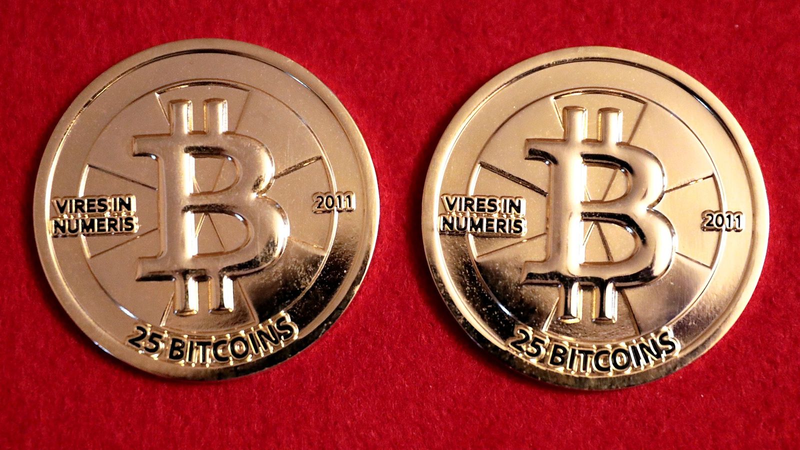 Two gold Casascius 25 BTC physical bitcoin rounds — Bitcoin's Q4 open with open interest down 11.9% and a $4.6 billion call wall above $90,000