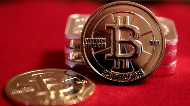 Two physical 25 BTC Casascius gold rounds on red velvet — THORChain v3.21 upgrade at block 28,366,100 and the RUNE levels that decide the next move