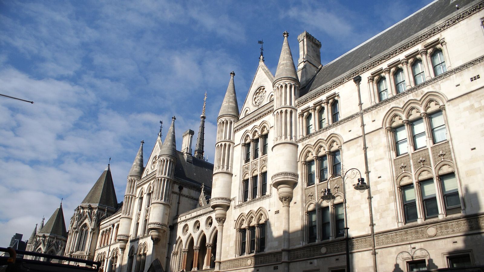 Royal Courts of Justice on the Strand, London — the High Court ruling that Chinese law decides ownership of 61,245 seized bitcoin