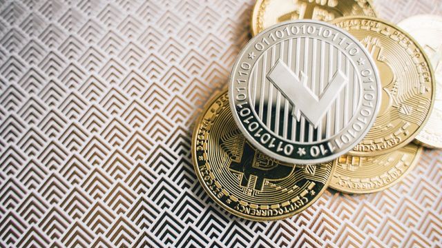 Litecoin and Bitcoin coins on a geometric surface — reading the 33,000 lines of Solidity behind the AERO redesign