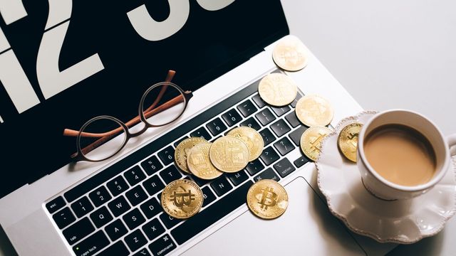 Bitcoin mining concept with coins and letter tiles — the BTC Mining Pool diamond contract returning 4 PH/s