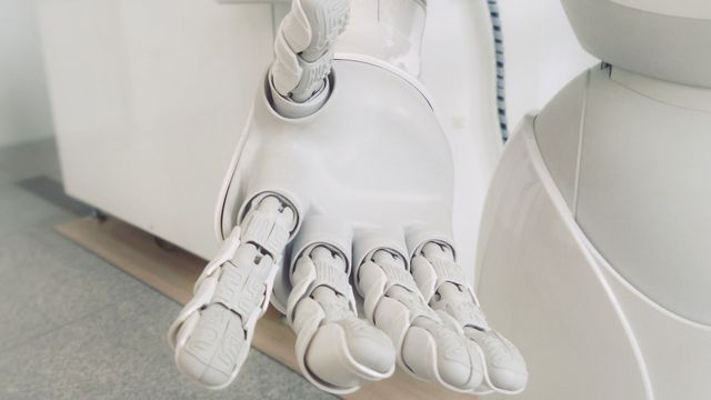 White humanoid robot — Worldcoin (WLD) rides the AI-crypto rotation after absorbing a 69M-token unlock