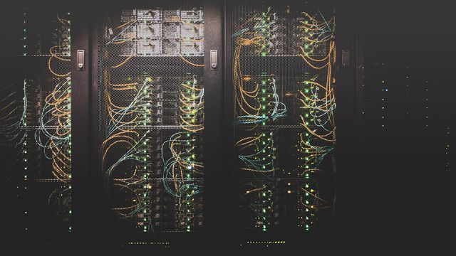 Server racks in a data center powering AI compute and mining