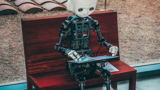 AI humanoid robot face — decentralized AI network theme