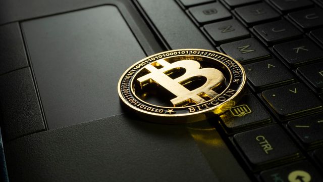 Ethereum coin symbol on a dark background