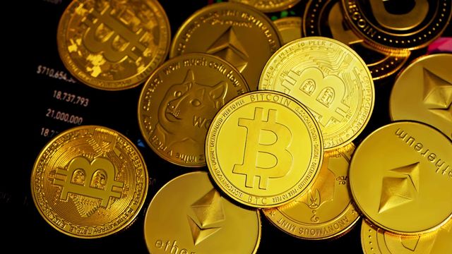 Crypto coins on a dark surface — Litecoin's institutional build-out